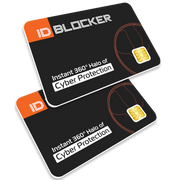 Two black ID Blocker cards with orange and white branding, shown overlapping on a plain white background. Each card includes text reading 'ID BLOCKER' and 'Instant 360° Halo of Cyber Protection,' plus a small SIM-style chip graphic and a circular shield icon.